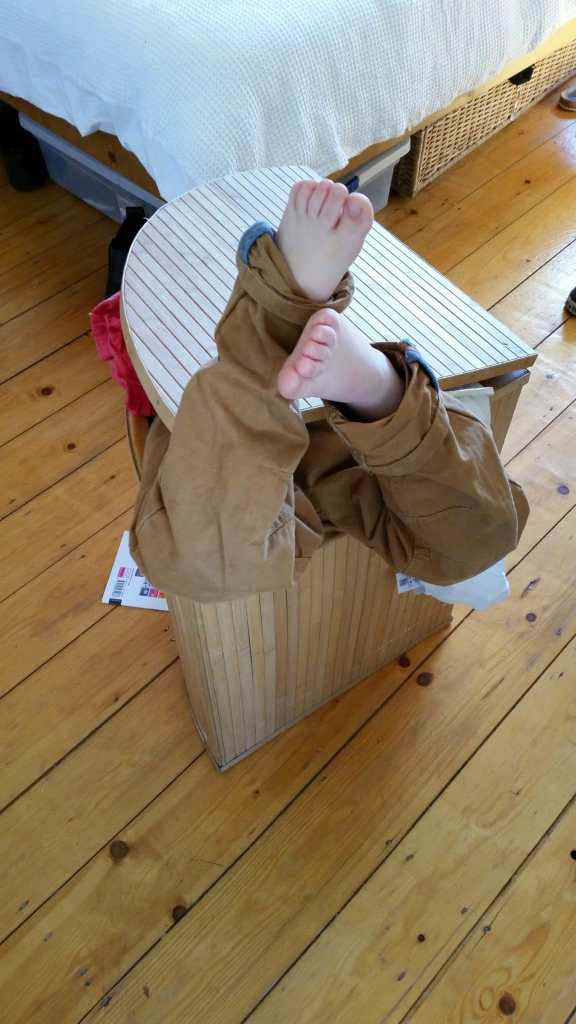 Office Mum - boy in laundry basket